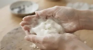 Creamy lather of natural goat milk soap for eczema showing a rich, moisturizing texture