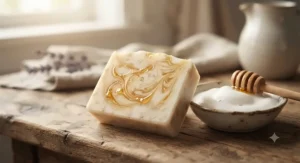 A rich, textured goat milk and honey soap bar showing natural golden honey swirls and a creamy lather.